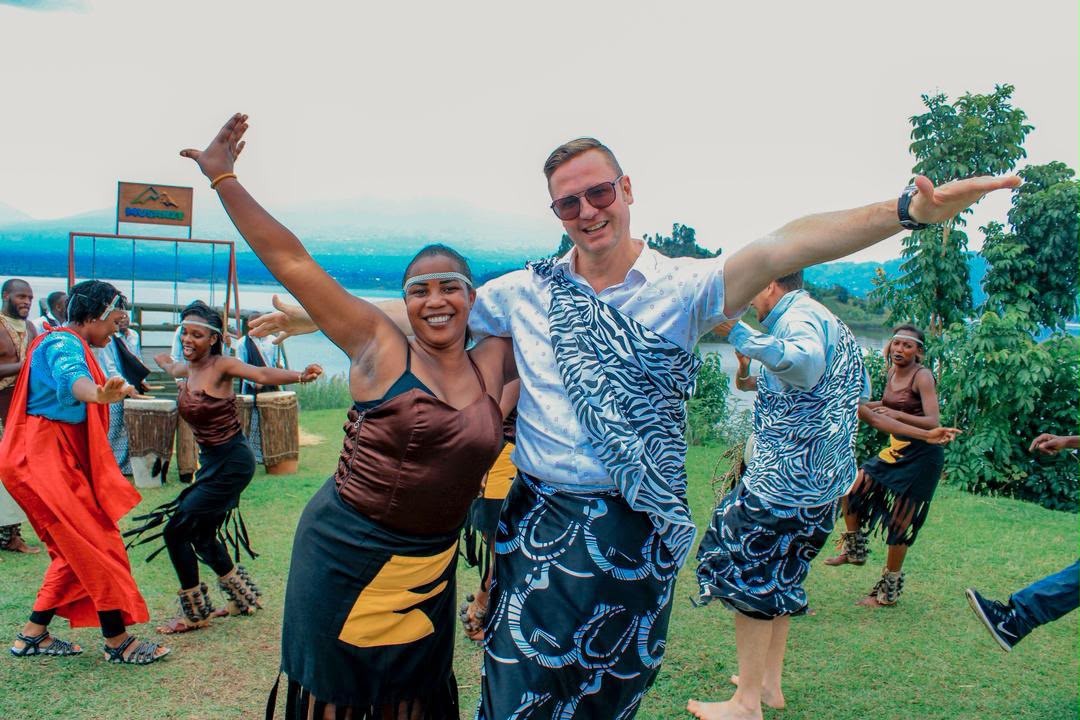 Travellers joining a cultural experience in Rwanda
